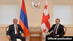 Georgia - Prime Minister Irakli Gharibashvili (R) meets with Armenian President Serzh Sarkisian, Tbilisi, 30Oct2015.