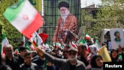 Ceremonie de marcare a 40 de zile de la moartea liderului suprem iranian, Ayatollah Ali Khamenei, la Teheran, pe 9 aprilie.