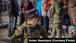 В мероприятиях по случаю пятой годовщины аннексии Крыма Россией участвуют и дети