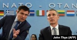 Ukranian Foreign Minister Pavlo Klimkin (left) and NATO Secretary-General Jens Stoltenberg at their meeting in Brussels on December 7.