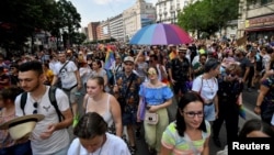 People attending the Budapest Pride march on July 24