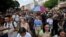 People attending the Budapest Pride march on July 24