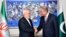 Iranian Foreign Minister Javad Zarif (left) with Pakistani Foreign Minister Shah Mahmood Qureshi in Islamabad.