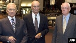 Apollo 11 crew members Buzz Aldrin (left), Michael Collins, and Neil Armstrong at the National Air and Space Museum in Washington on July 19.