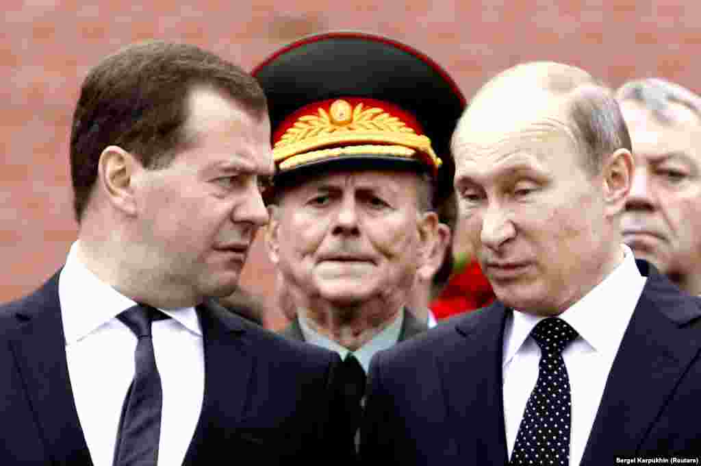 Russian President Vladimir Putin (right) and Prime Minister Dmitry Medvedev attend a ceremony to commemorate the anniversary of the beginning of the Great Patriotic War against Nazi Germany in 1941 at the Tomb of the Unknown Soldier by the Kremlin walls in Moscow. (Reuters/Sergei Karpukhin)