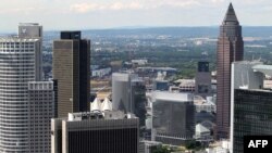 An overview taken from the top of Frankfurt's Maintower shows the headquarters of the DZ Bank AG (German Central Co-operative Bank) (L), the Messeturm sky scraper (2ndR), the Sparkassen Tower (R) and the headquarters of the Deutsche Bank (R) in the distri