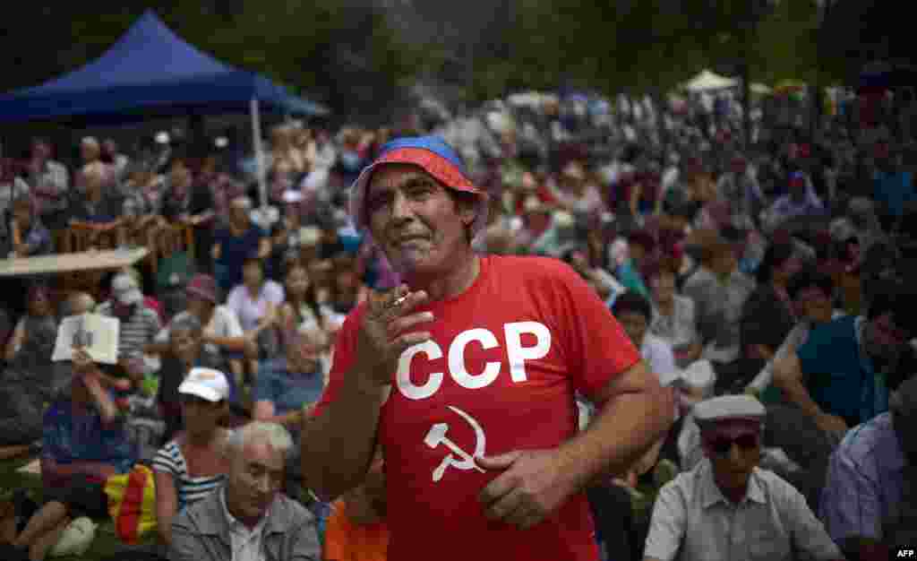 A man wears a jersey reading&nbsp;CCCP&nbsp;(U.S.S.R.) during the annual Russophiles Meet&nbsp;at Koprinka dam near the central Bulgarian town of Kazanlak. Some 7,000 people joined in this year to celebrate their love for Russian politics and culture with traditional songs and dances, food, and drinks. (AFP/Nikolay Doychinov) 