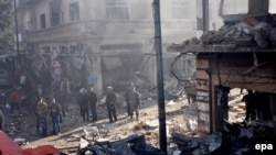 Homs şäheriniň Al-Zahraa etrabynda bolan bomba partlamasynyň netijeleri, dekabr, 2015 