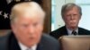 US President Donald Trump speaks alongside National Security Adviser John Bolton (R) during a Cabinet Meeting in the Cabinet Room of the White House in Washington, DC, May 9, 2018
