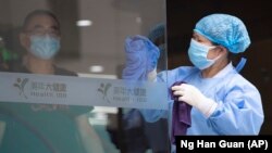 Пекін вводить заходи «воєнного часу» для боротьби зі спалахом COVID-19 – фоторепортаж