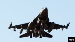 A US F-16 fighter lands in Lask, central Poland, on March 13 for joint military exercises amid the Ukraine crisis .