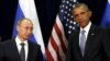 Russian President Vladimir Putin (left) meets with his U.S, counterpart Barack Obama at the UN in New York on September 28. 