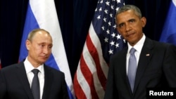 Russian President Vladimir Putin (left) meets with his U.S, counterpart Barack Obama at the UN in New York on September 28. 