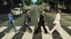 George Harrison, Paul McCartney, Ringo Starr, John Lennon traversează Abbey Road. Londra, 8 August 1969