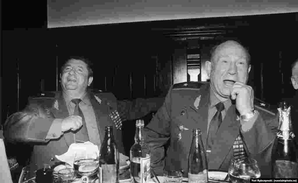 Soviet cosmonauts Pyotr Klimuk (left) and Aleksei Leonov partying in the early 1990s. Klimuk was the first Belarusian in space. Leonov was the first man to carry out a spacewalk when, in March, 1965, he floated through space attached to his spacecraft with a rope tether.&nbsp;