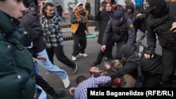 Georgian police violently disperse protest in Tbilisi on November 19.