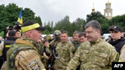 Poroshenko speaking to Ukrainian soldiers in Slovyansk on July 8.