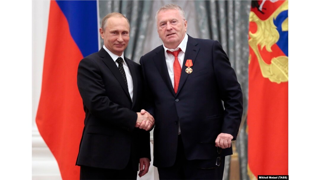 Russian President Vladimir Putin (left) bestows an award on Vladimir Zhirinovsky in May 2015.