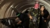 Боевик ХАМАС в тоннеле под Газой, 2014 год