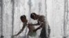 Boys cool themselves in a fountain during a hot summer day in central Minsk. (Reuters/Vasily Fedosenko)