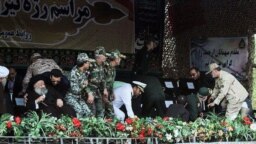 This picture taken on September 22, 2018 in the southwestern Iranian city of Ahvaz shows Officials during the terror attack on a military parade.