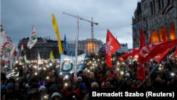 The January 5 rally, organized by opposition parties, trade unions and civic groups, saw protesters marching to the parliament building, carrying banners such as "Sweep away the regime" and "Slave law." (file photo)