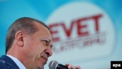 Erdogan at a campaign rally urging voters to vote "yes" to expand the president's powers.