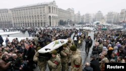Похороны украинских военнослужащих, погибших в боях на востоке Украины. Киев, 1 февраля 2017 года.