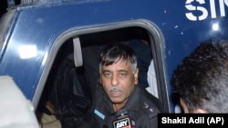 FILE: Former Pakistani police officer Rao Anwar talks to a reporter in Karachi in January 2018.