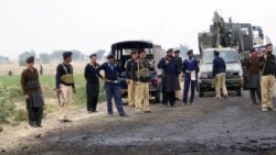 په ټانک کې پولیس تر یو برید وروسته د پېښې په ځای کې ولاړ دي - انځور له ارشیفه. 