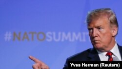 U.S. President Donald Trump holds a news conference after participating in the NATO Summit in Brussels, July 12, 2018