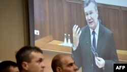 Віктор Янукович під час відео-допиту. 28 листопада 2016 року