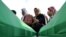 Coffins of newly identified victims during preparations for their mass burial at the Potocari memorial cemetery near Srebrenica 