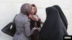 Women in the country of more than 80 million people are required to cover their heads, necks, and hair, a law enforced by the country's morality police. (file photo)