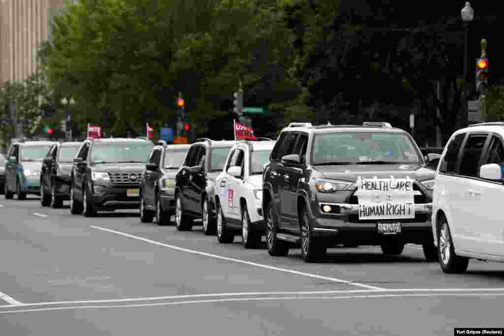Union members in vehicles rally to call for 'racial and economic justice' in the aftermath of the death in Minneapolis police custody of George Floyd, on Capitol Hill in Washington, U.S., June 17, 2020.