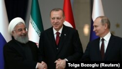 Слева направо: Хасан Роухани, Реджеп Эрдоган, Владимир Путин во время саммита в Анкаре.