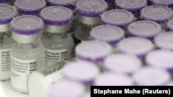 Vials of the Pfizer-BioNTech Covid-19 vaccine are pictured in an ultra low temperature freezer at the hospital in Le Mans, as part of the coronavirus disease (COVID-19) vaccination campaign in France, January 14, 2021.