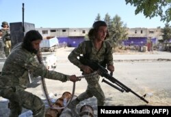 Підтримувані Туреччиною сирійські бойовики у місті Рас-аль-Айн. жовтень 2019 року