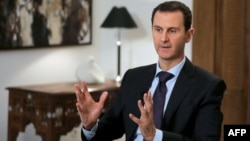 Board members of a Moscow bank have been blacklisted for allegedly providing financial services to the regime of Syrian President Bashar al-Assad (pictured, file photo).