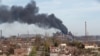 Дым над заводам «Азоўсталь» пасьля расейскіх абстрэлаў. Марыюпаль, 25 красавіка