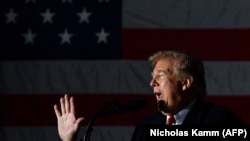 U.S. President Donald Trump speaking at an election rally in Illinois.