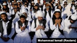 Newly freed Taliban prisoners pray at Pul-i-Charkhi prison in Kabul on May 26.