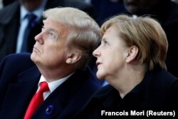 U.S. President Donald Trump (left) and German Chancellor Angela Merkel (file photo)