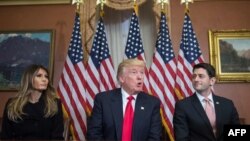 U.S. President-elect Donald Trump speaks to the press with his wife Melania and House Speaker Paul Ryan at the U.S. Capitol in Washington on November 10.