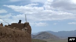 Kandahar-Tarin Kot ýolunyň ýakasy