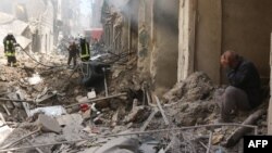 Один из подвергшихся ракетному обстрелу кварталов Алеппо