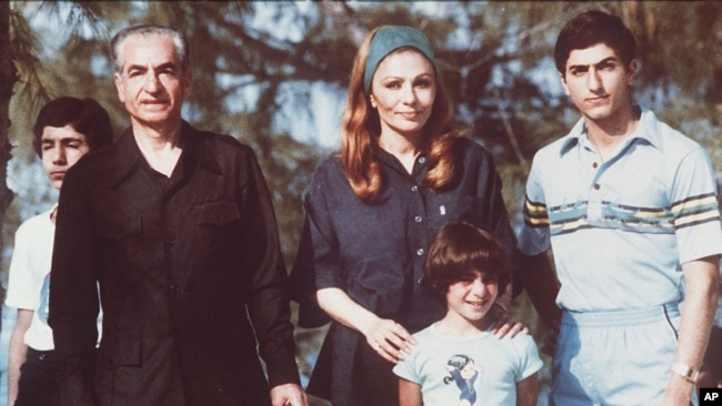 The shah of Iran (left) with his wife and sons Crown Prince Reza on right) and daughter shown during their stay in the Bahamas in April 1979.
