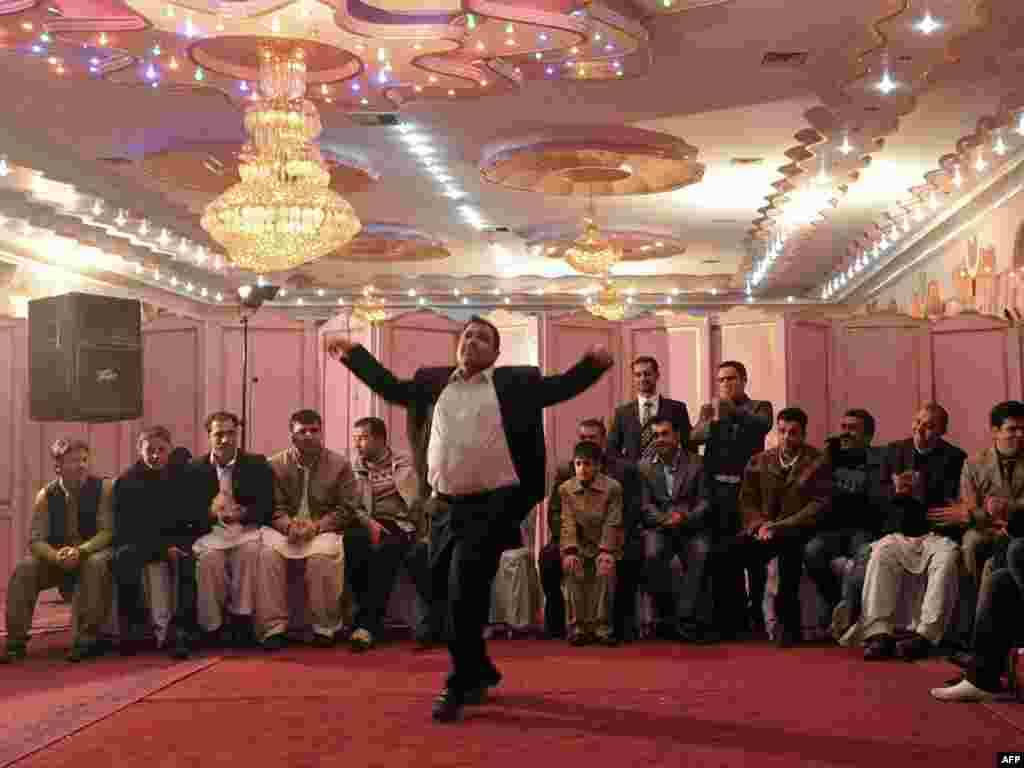 As a civil servant, Afghan Ahmad Mahfooz earns nearly 10 times the average annual salary in his impoverished homeland, but he still cannot afford to marry his fiancee. Already thousands of dollars in debt after hosting a lavish engagement party for 500 guests, Mahfooz says he doesn't know how he will ever afford the kind of wedding his wife-to-be and her family expect. Photo by Marai Shah for AFP