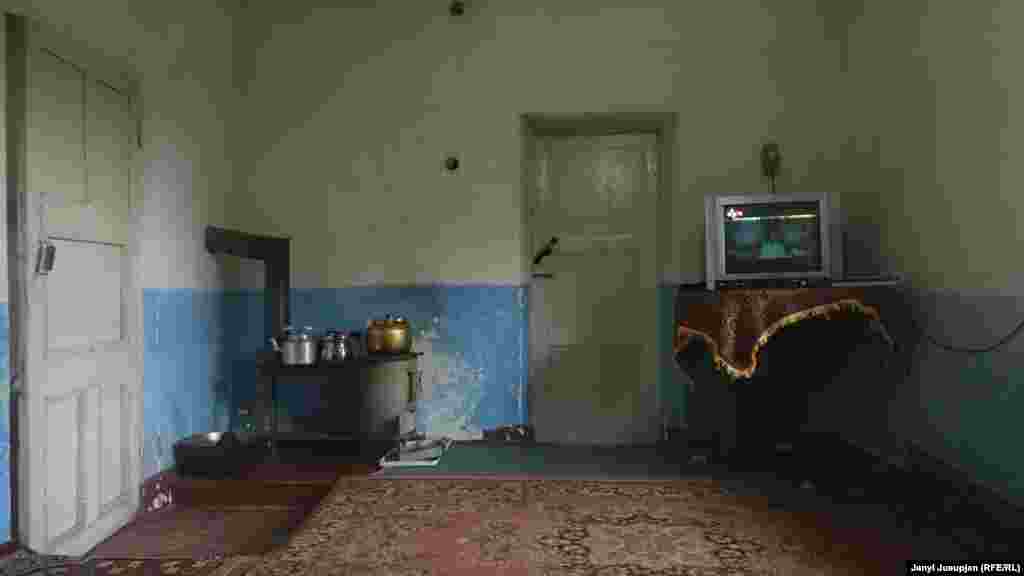 The household of Avaz. Meals are cooked on a stove fire around the year. When electricity is provided in the evening for a few hours, villagers watch satellite TV programs from Uzbekistan and Iran. No video signals reach them from Kyrgyzstan or Tajikistan.