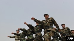 Afghanistan -- fghan National Army (ANA) soldiers march during a graduation ceremony at Ghazi Military Training Center in Kabul, 15Jul2010 